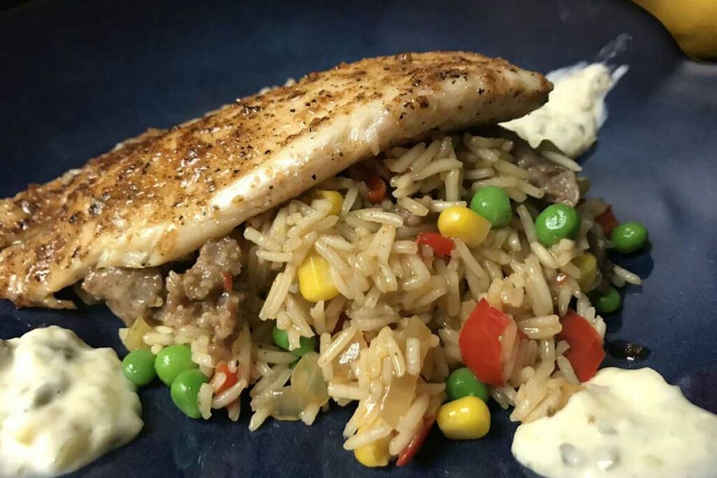 tilapia on dirty rice