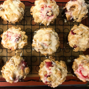 Clementine-Glazed-Cranberry-Walnut-Muffins on a rack.