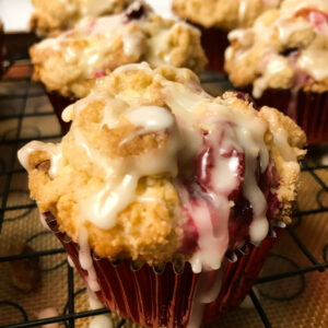 Clementine-Glazed-Cranberry-Walnut-Muffins on a rack.