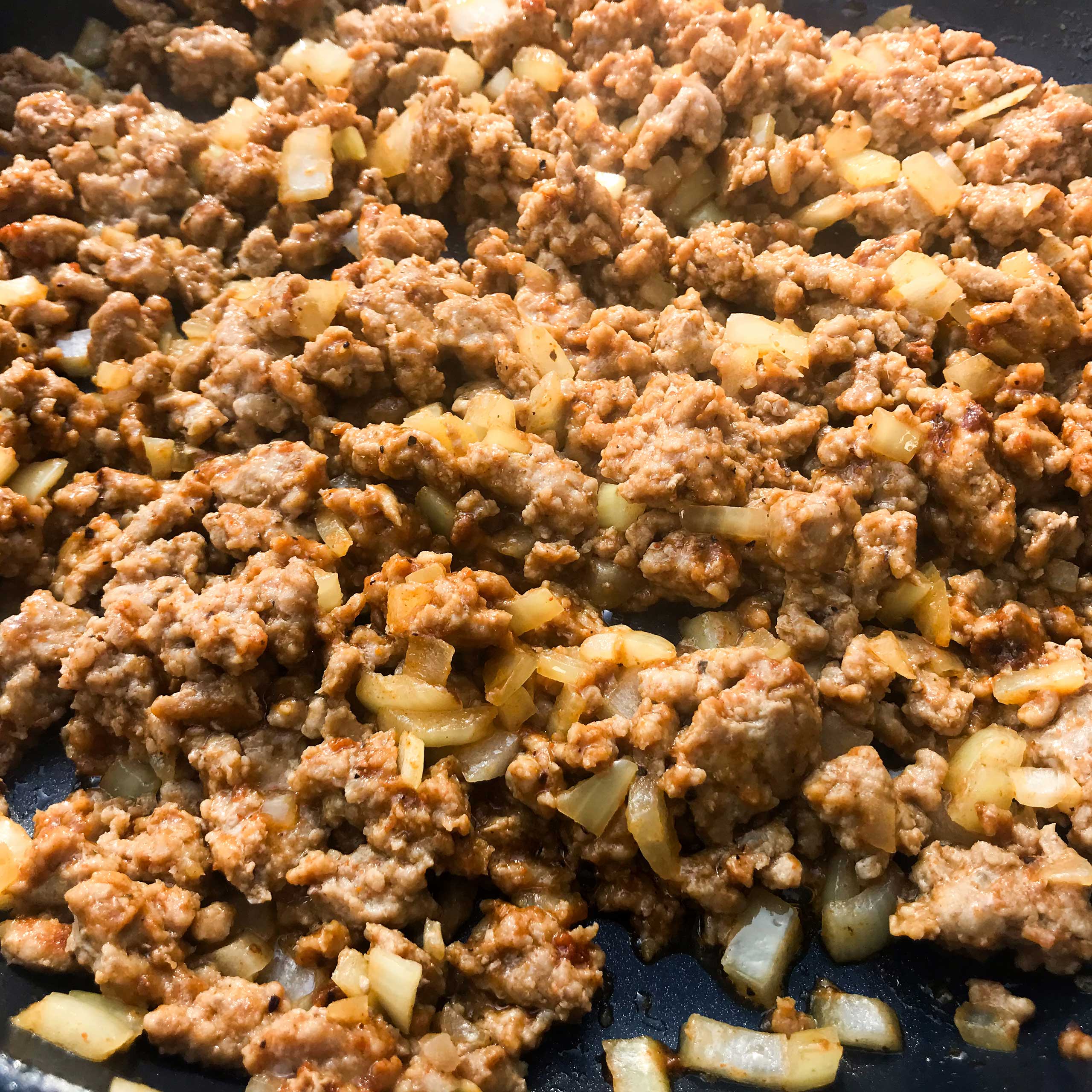 cooked taco meat in skillet.