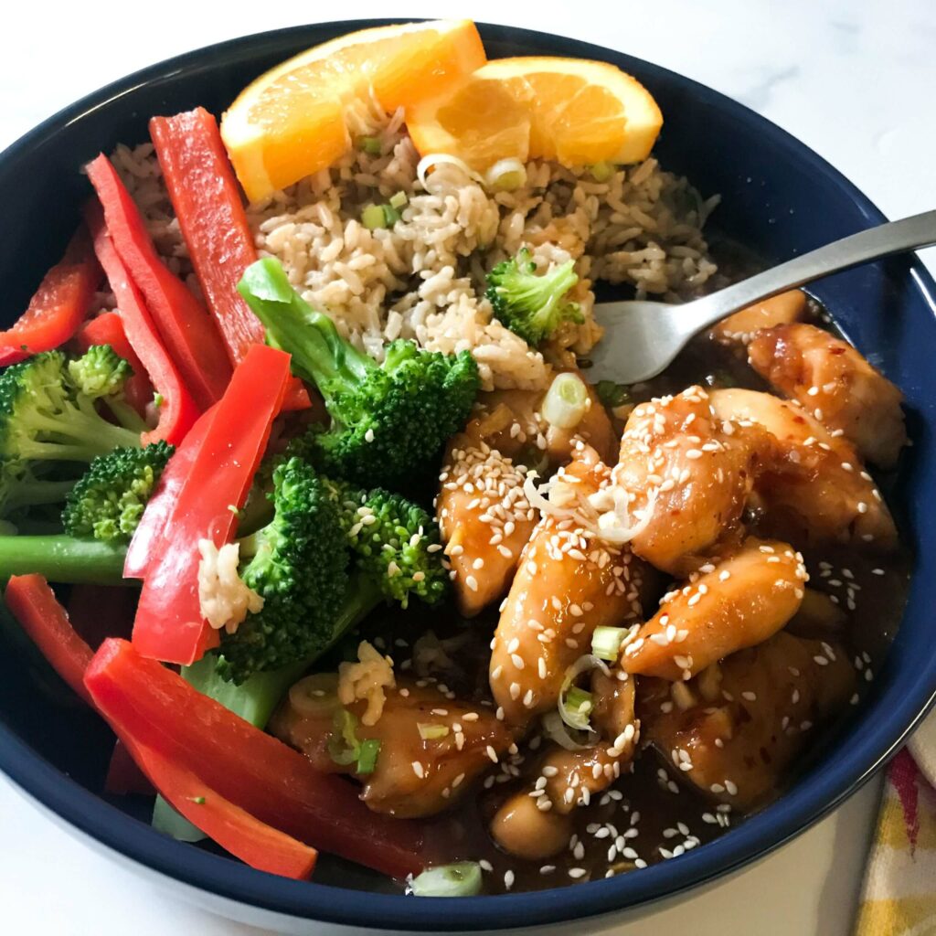 bowl of healthier orange chicken.
