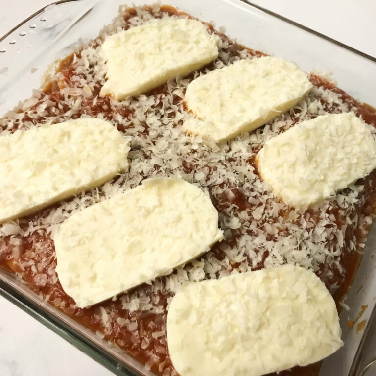 grated parm on top of mozzarella.