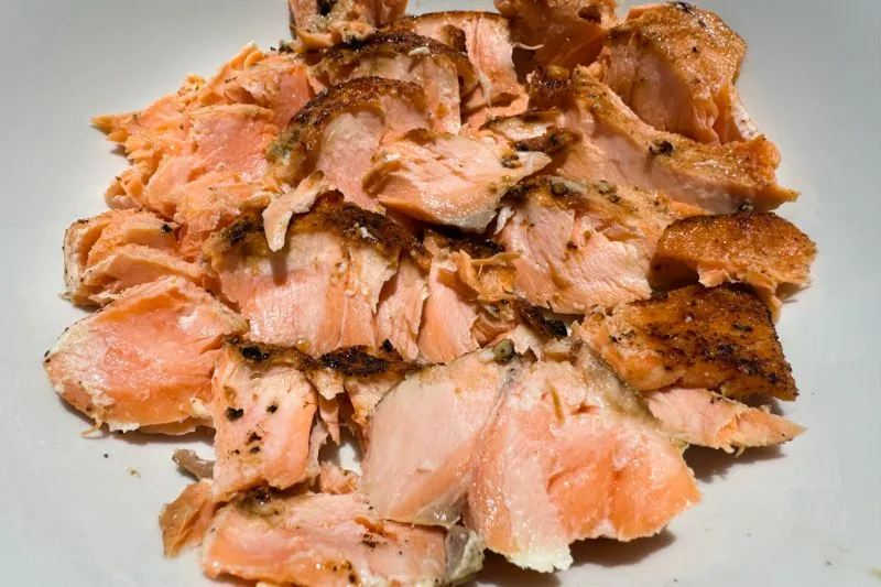 flaked salmon in a bowl.