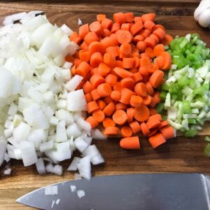 chopped veggies on a cutting board.