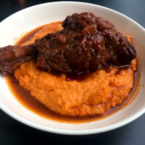 braised lamb shanks on whipped sweet potatoes.