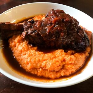 braised lamb shanks on whipped sweet potatoes.