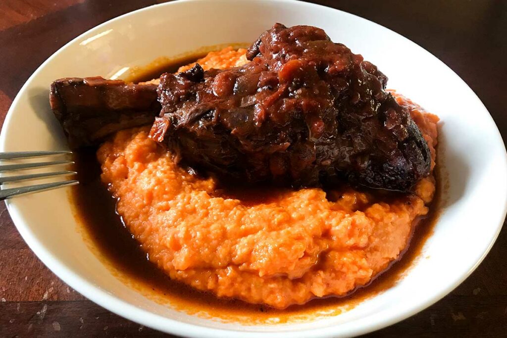 braised lamb shanks on whipped sweet potatoes.