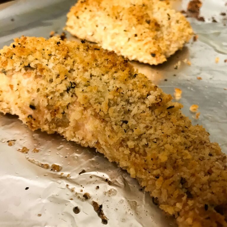 baked salmon on a baking sheet.