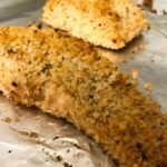 baked salmon on a baking sheet.