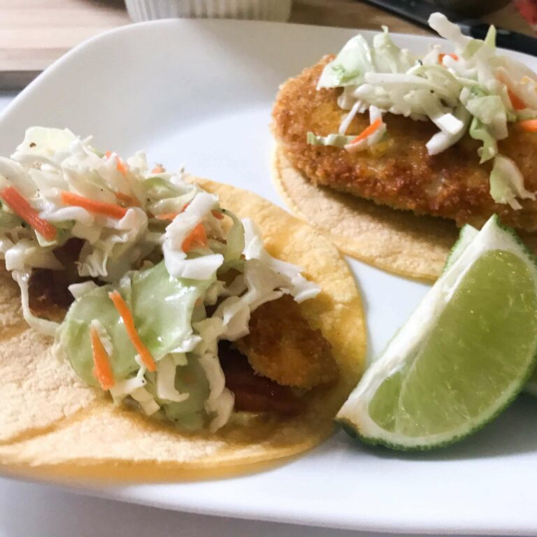 fish tacos with lime wedge.