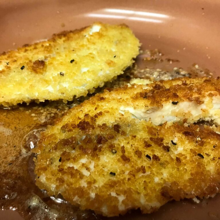 fried fish in skillet.