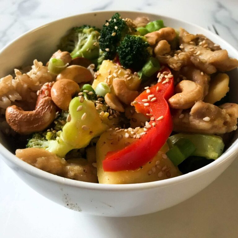 bowl of pineapple and mango chicken stirfry.