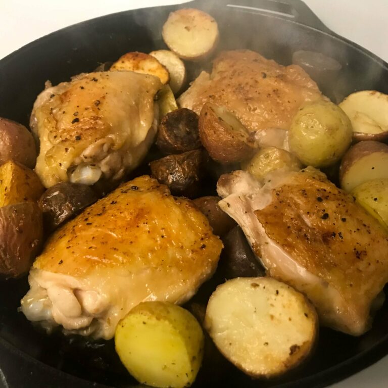 cast-iron skillet chicken with baby potatoes.