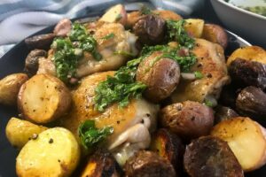 cast-iron skillet chicken with baby potatoes.