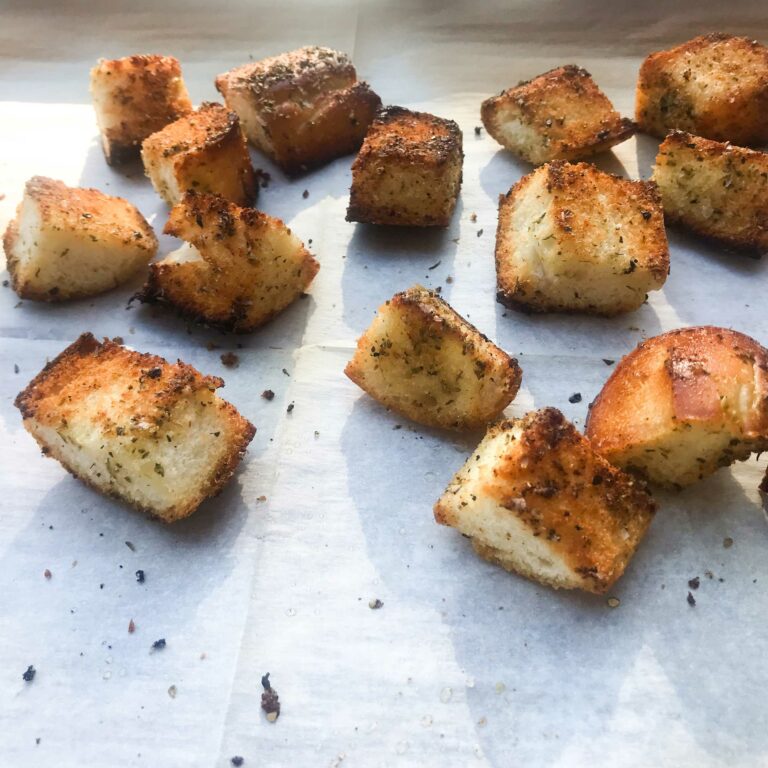 toasted croutons on a baking sheet.