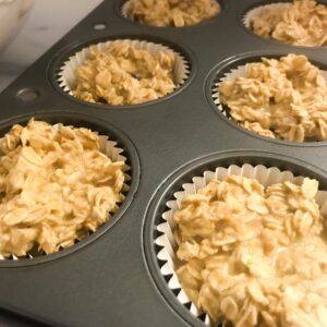 Peanut Butter and Jelly Oatmeal Muffins raw in a pan.