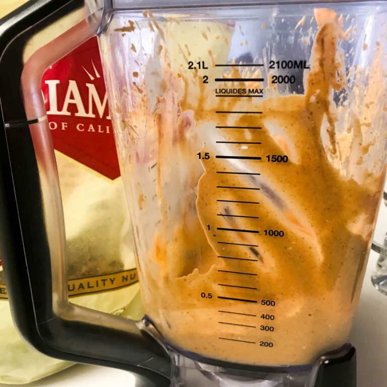 blender with pumpkin mousse in it.