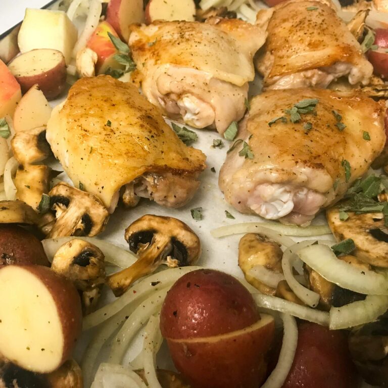 Roasted Chicken Thighs with Sage, Mushrooms, Baby Potatoes, and Apples
