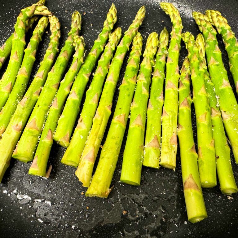 asparagus cooking in skillet.