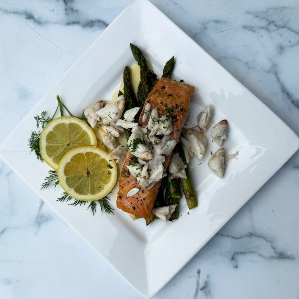 salmon oscar on a plate.