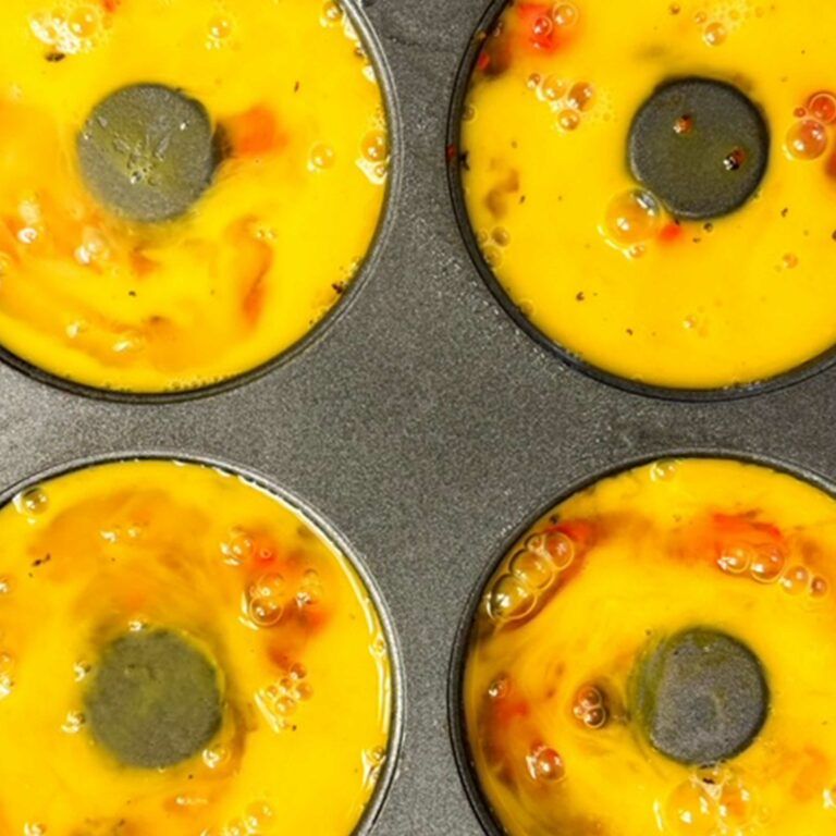 eggs baking in donut pan.