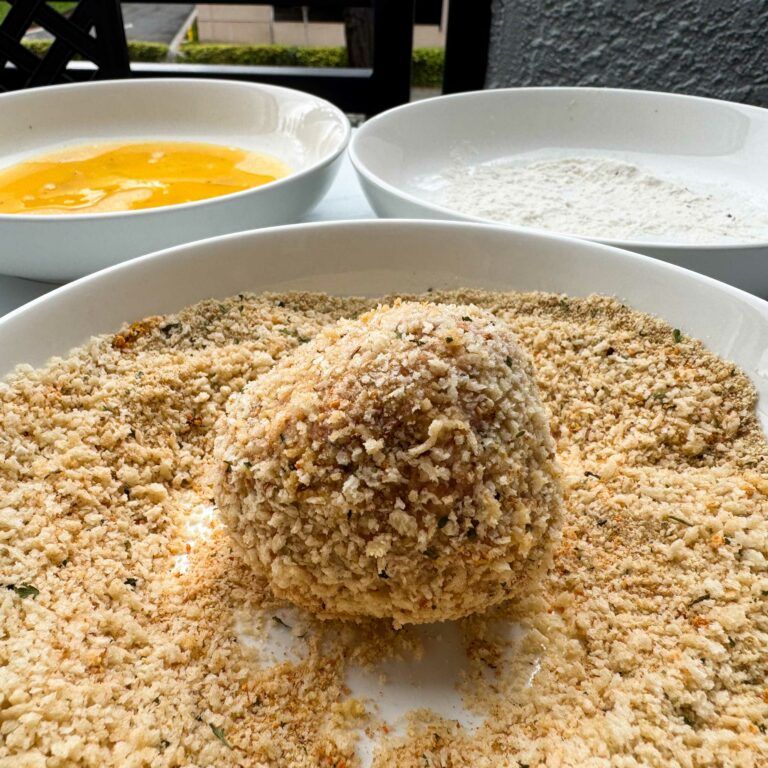 Turkey-Parmesan-Stuffed-Meatball rolled in breadcrumbs.