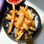 Parmesan Truffle Fries on a plate.