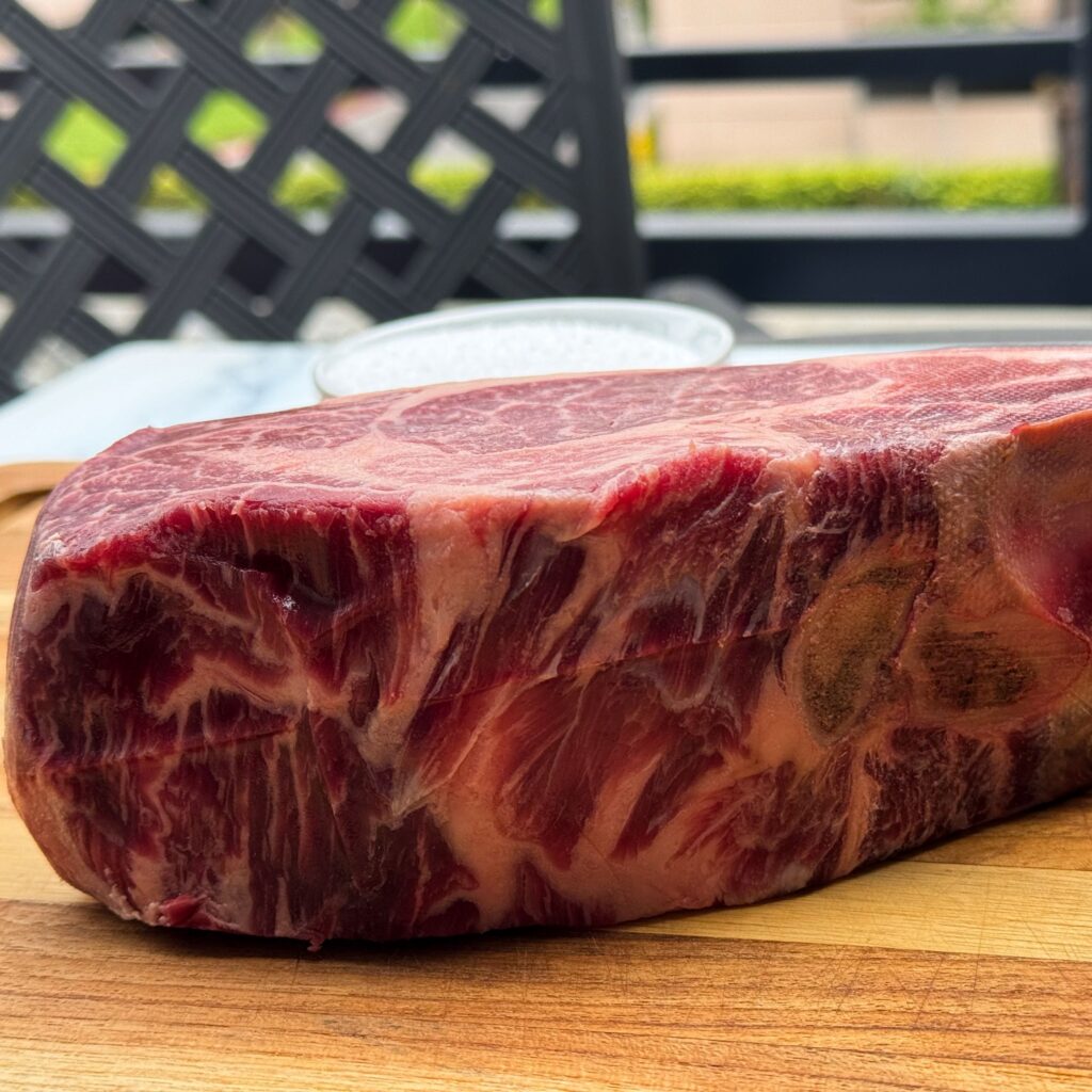 3 inch thick raw steak.