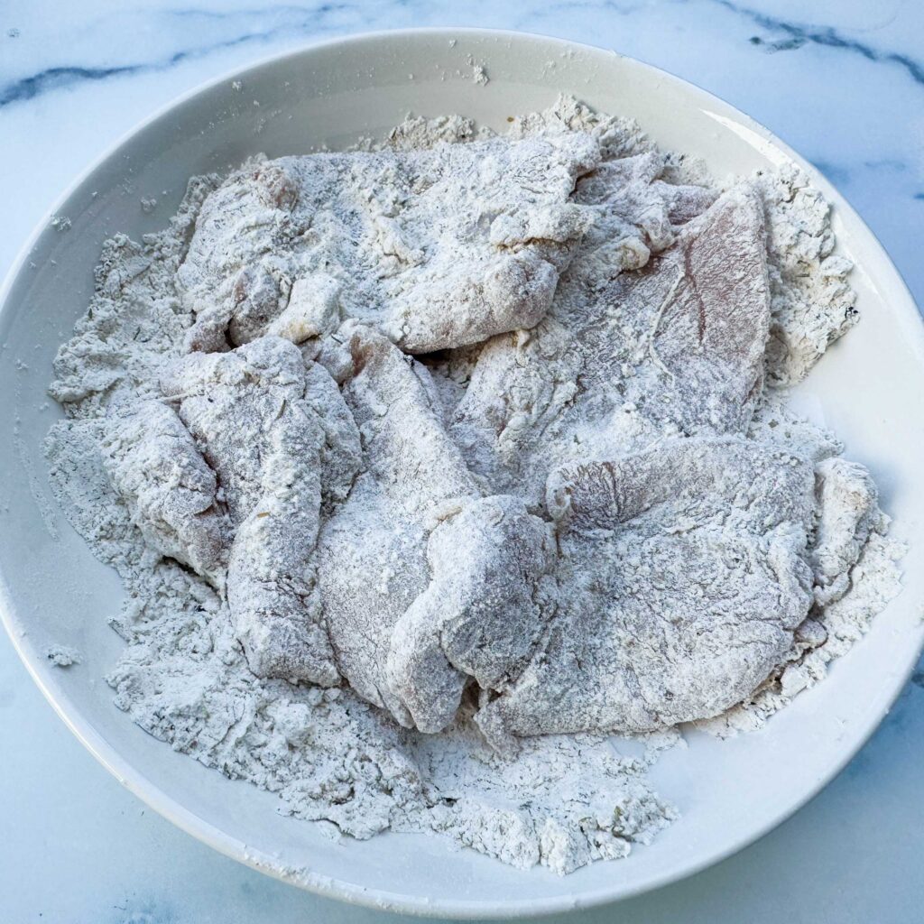 floured chicken.