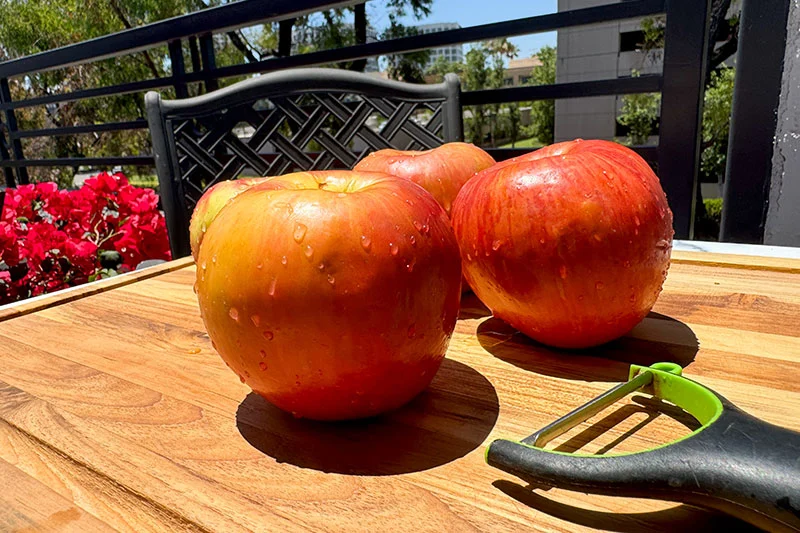 apples on a cutting board.