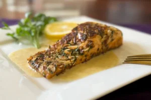 Almond Crusted Salmon With Lemon & Leek Crema.