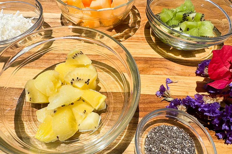 chopped toppings in bowls.