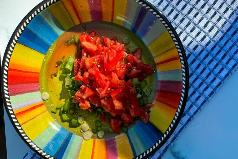 ingredients for fresh salsa in a bowl.