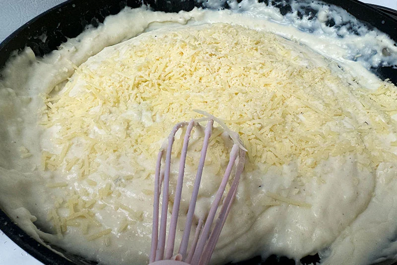 cheese added to cream sauce.