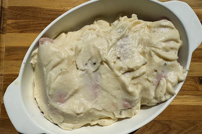ham wrapped endive covered with Mornay.sauce.