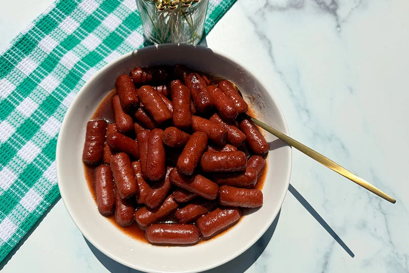 sweet and spidy lil beef smokies in a bowl.