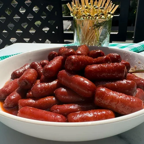 sweet and spidy lil beef smokies in a bowl.