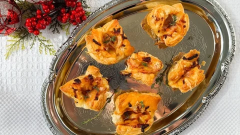 croque monsieur appetizers on a serving tray.