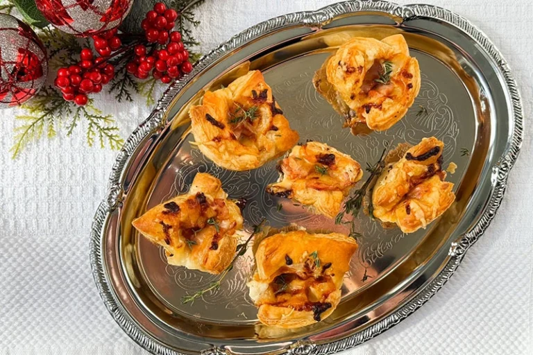 croque monsieur appetizers on a serving tray.