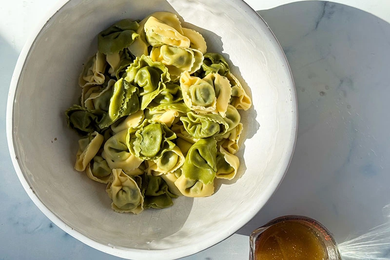 cooked tortellini in a bowl.