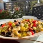 a platter of Italian tortellini pasta salad.