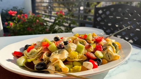 a platter of Italian tortellini pasta salad.