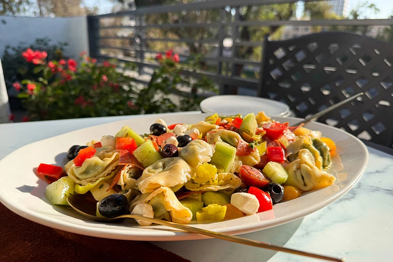 a platter of Italian tortellini pasta salad.