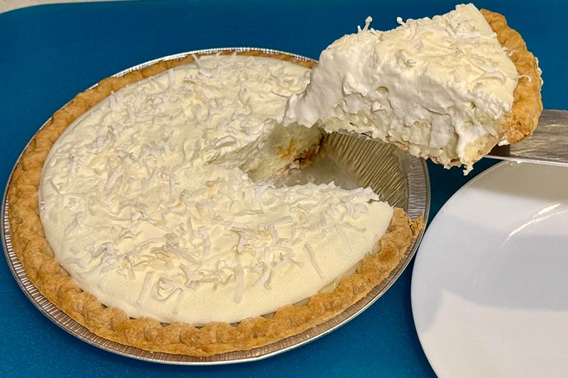 a slice of coconut cream pie.