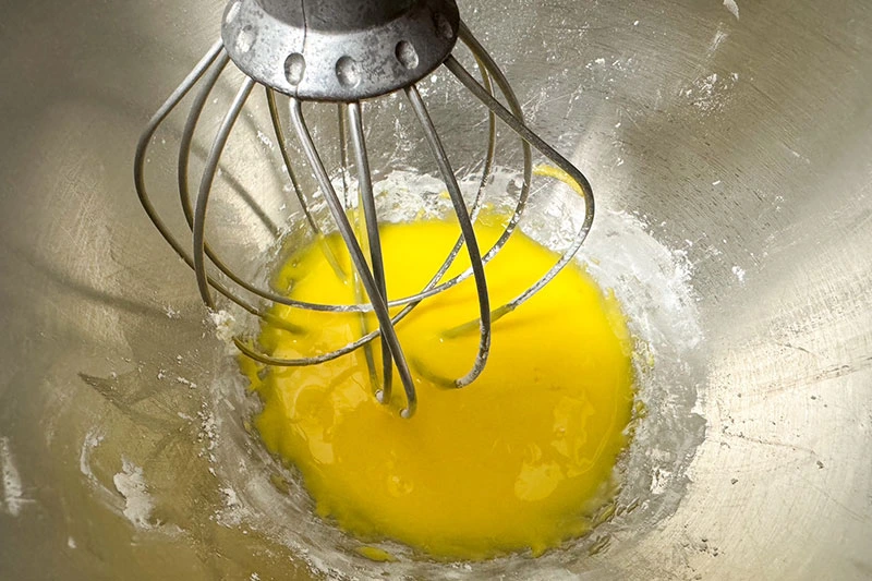 egg yolks and cornstarch in stand mixer.