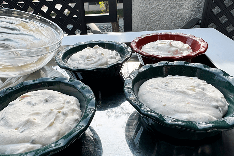 pie plates filled with ricotta and mascarpone cheese filling.