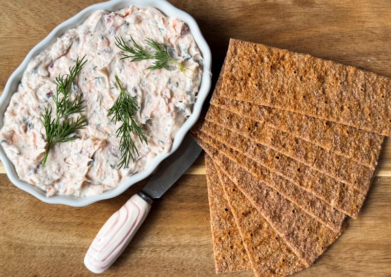 alaskan smoked salmon spread with crackers.