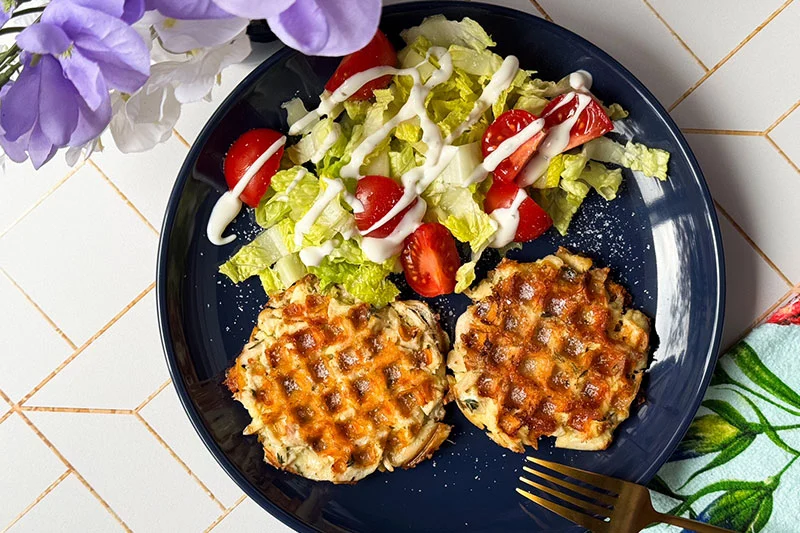 high protein waffle made with chicken on a plate.