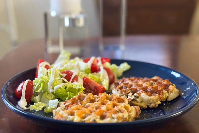 high protein waffle made with chicken on a plate.