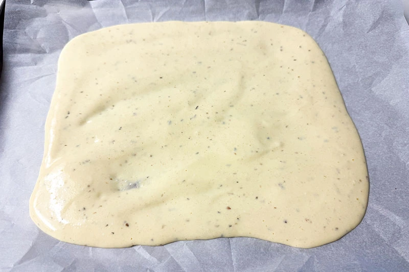 cottage cheese flatbread batter on tray.